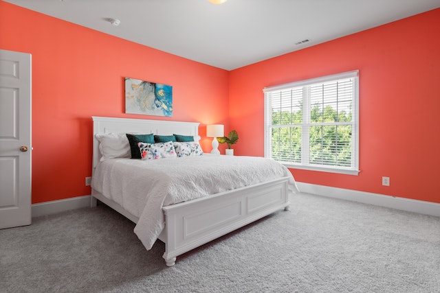 Step into this vibrant and energetic room, where the walls are painted in an eye-catching and lively mix of colors. The bold color scheme creates an atmosphere that is both playful and lively, perfect for inspiring creativity and imagination. georgia painters pro